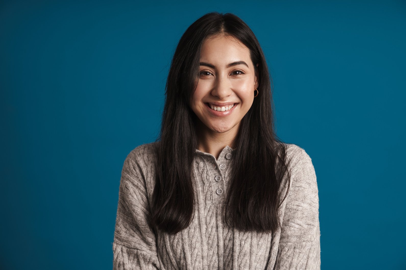 Happy Smiling Woman Portrait Isolated on Blue